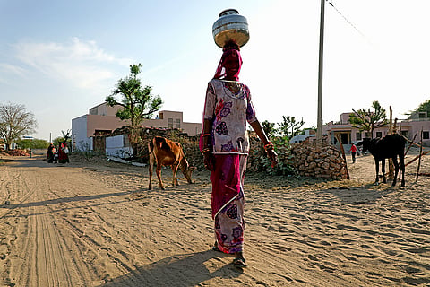 Women Carrying Water On Head 